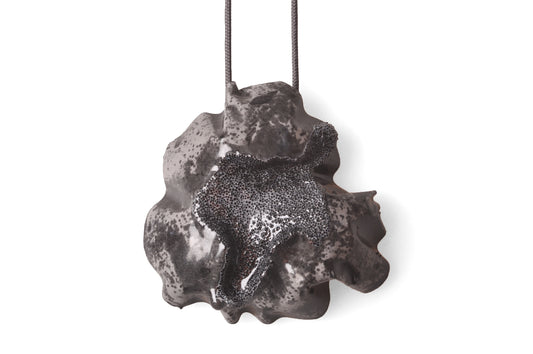 black acid necklace