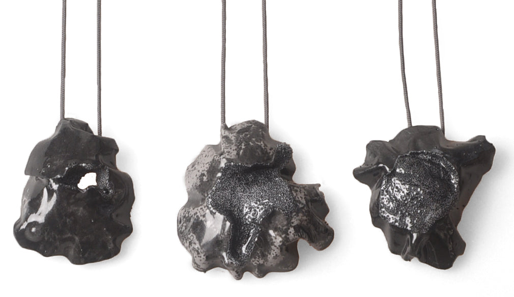 black acid necklace