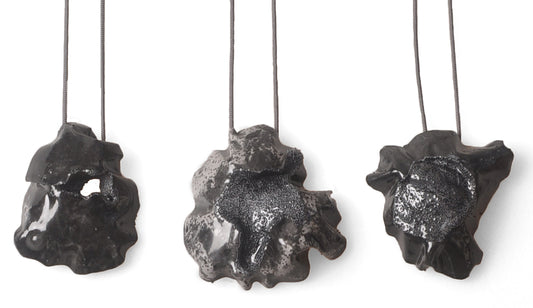 black acid necklace