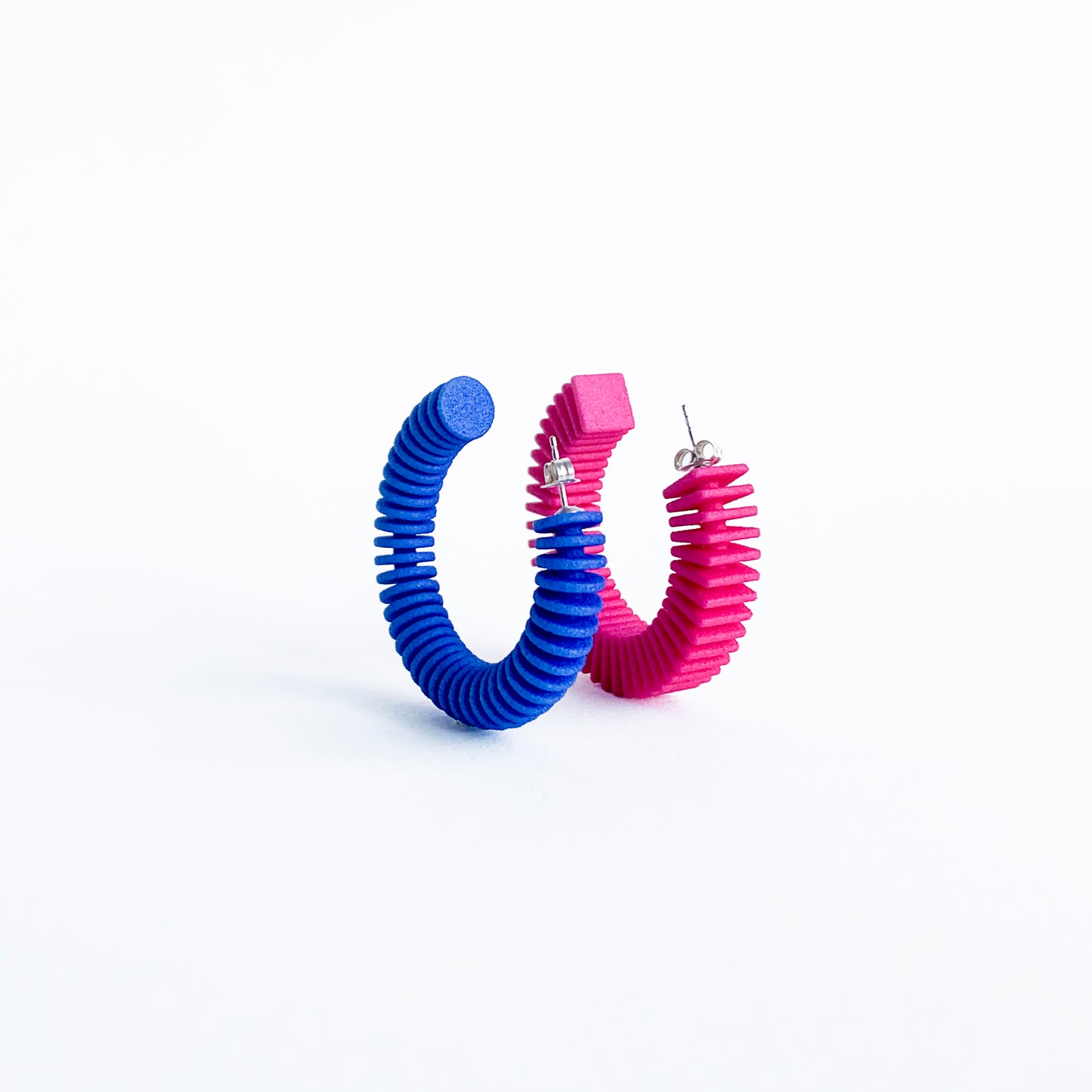 Mismatched optical earrings